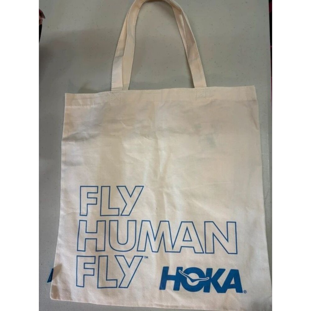 Hoka fly human fly canvas tote bag